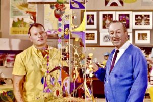 rolly crump and walt disney with tower of the four winds model