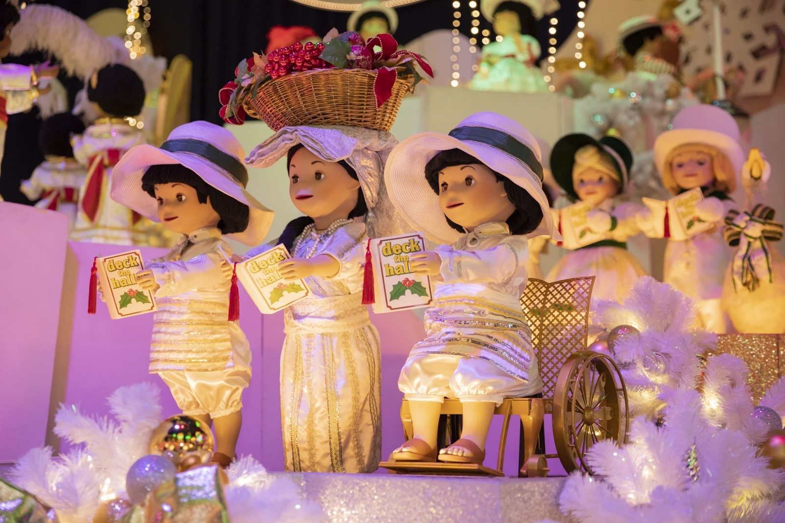 its a small world christmas scene with wheelchair doll