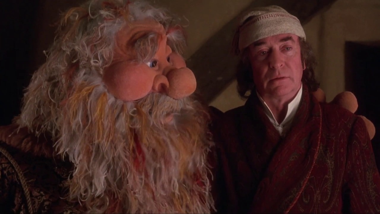 scrooge and ghost of christmas present in muppet christmas carol