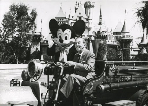 walt disney with mickey mouse in disneyland