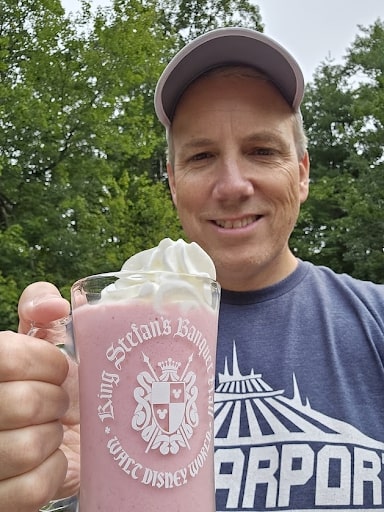 jim smith with king stefans banquet hall mug